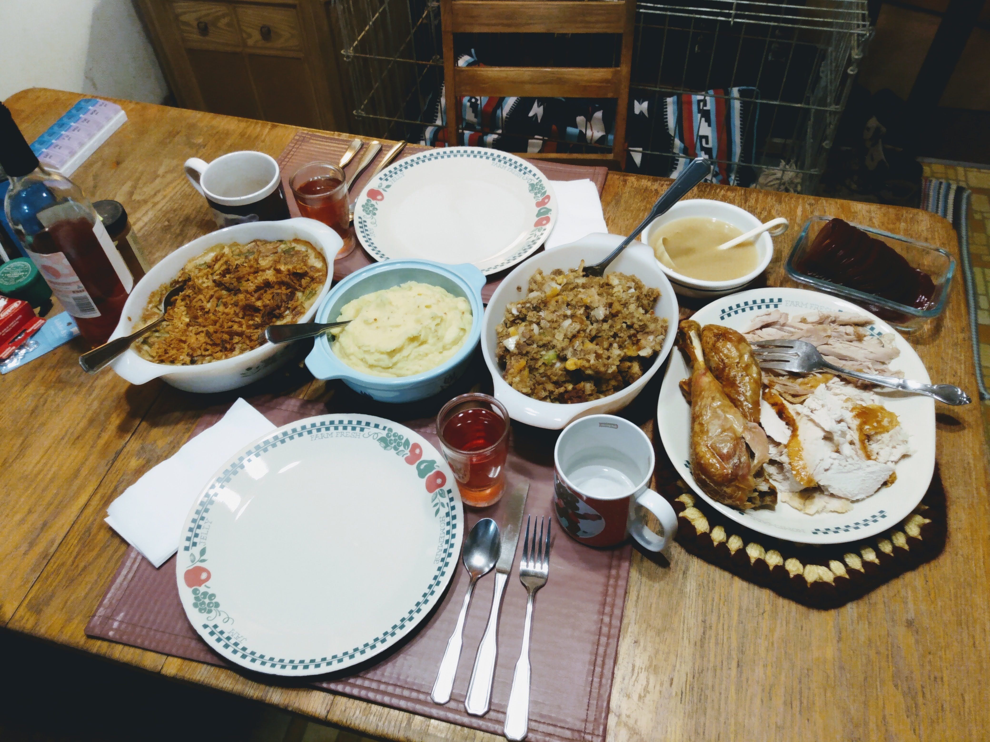 Table for two with dishes arrayed for serving